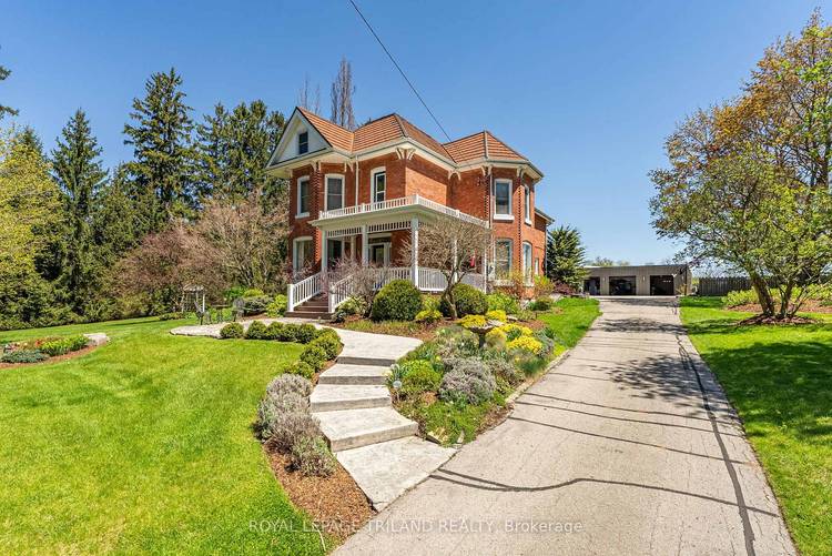 Welcome Home to this Stunning Red Brick Home with 5 bay detached garages, in Union, Ontario !
