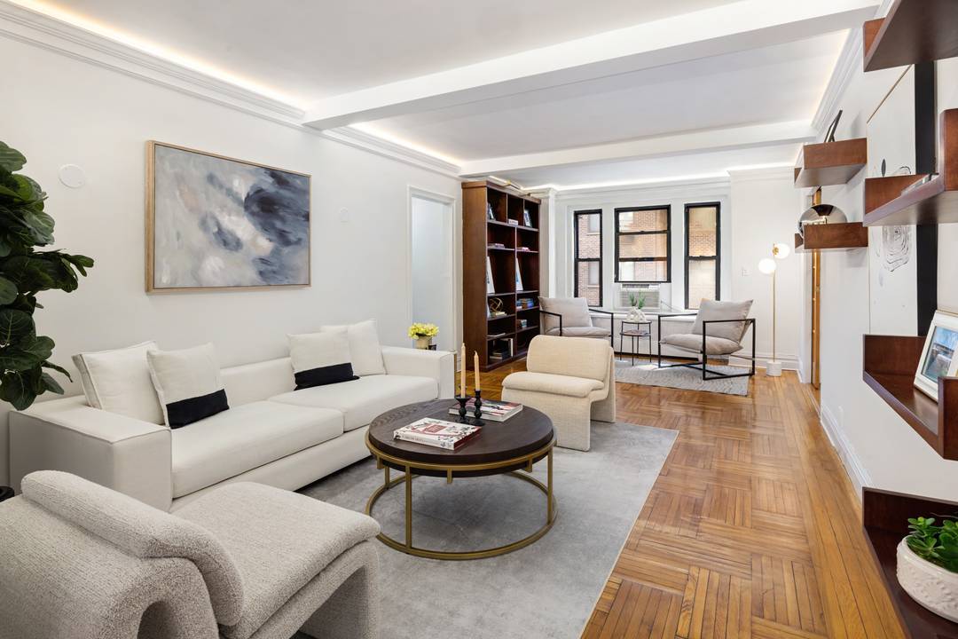 Renovated, pre war, 3 bed, 2 bath home with dining area in a full service co op, a block and a half from Central Park.