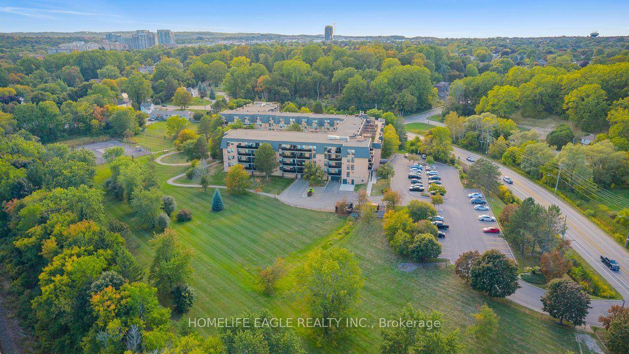 The Perfect 2 Bedroom Backing Onto Unobstructed Conservation Green Scenery !
