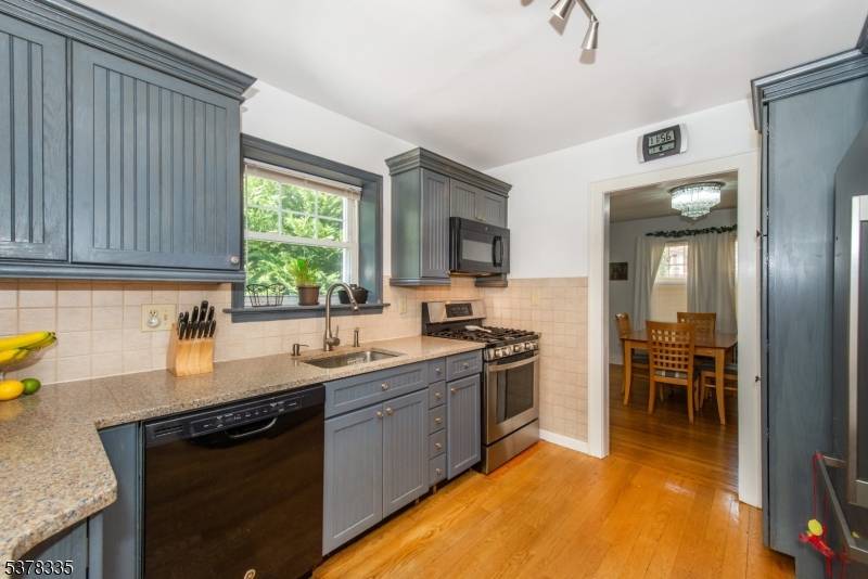 Located on a quiet dead end street in Wayne, this starter home offers a large yard and a versatile layout.