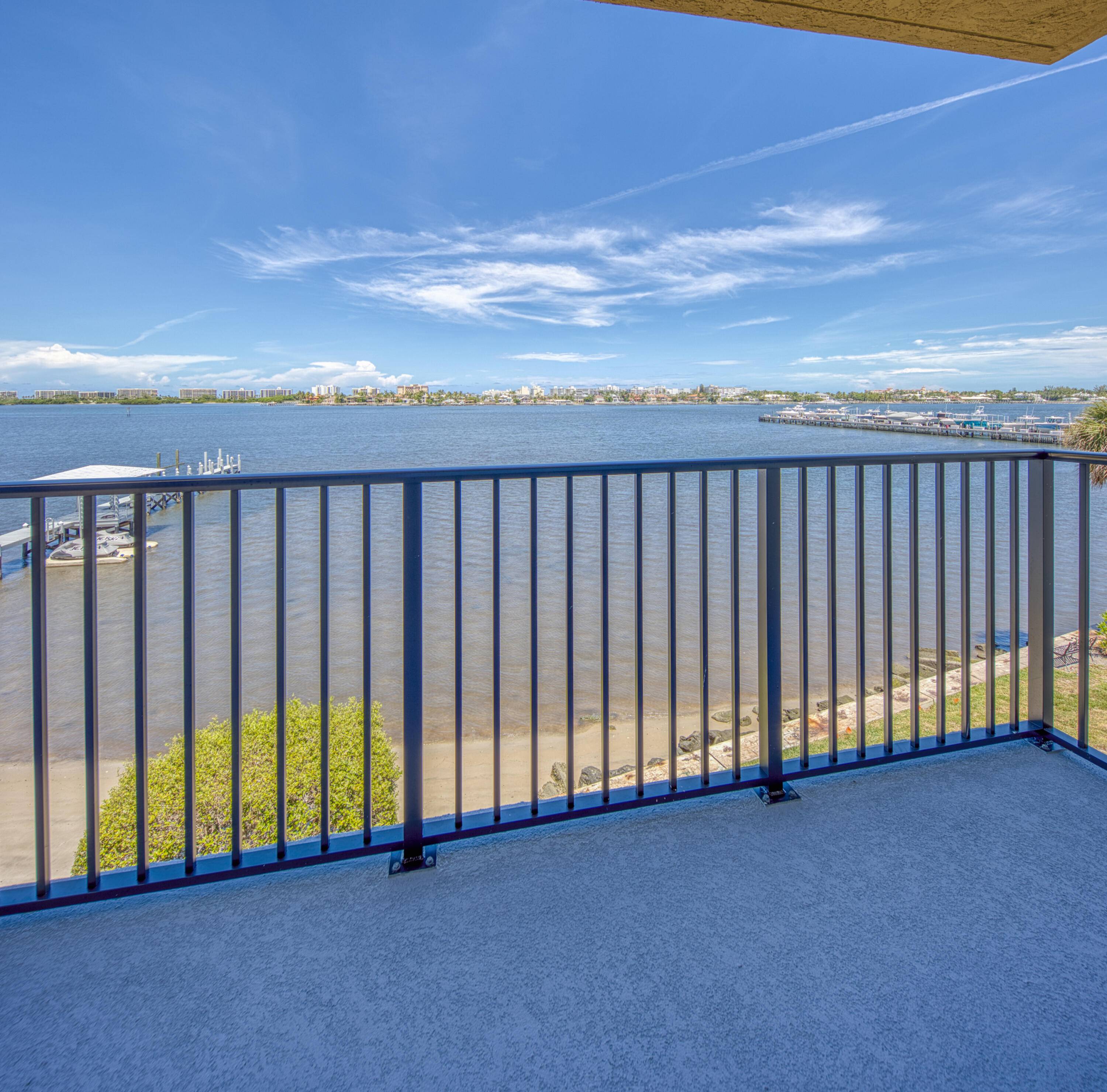 Amazing views up and down the intracoastal from this corner unit with a wrap around balcony where you can enjoy cooling breezes and the sound of the waves below.