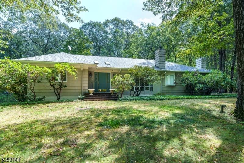 Welcome to this Beautiful Retreat Home in the 24 hour Gated Community of Smoke Rise.