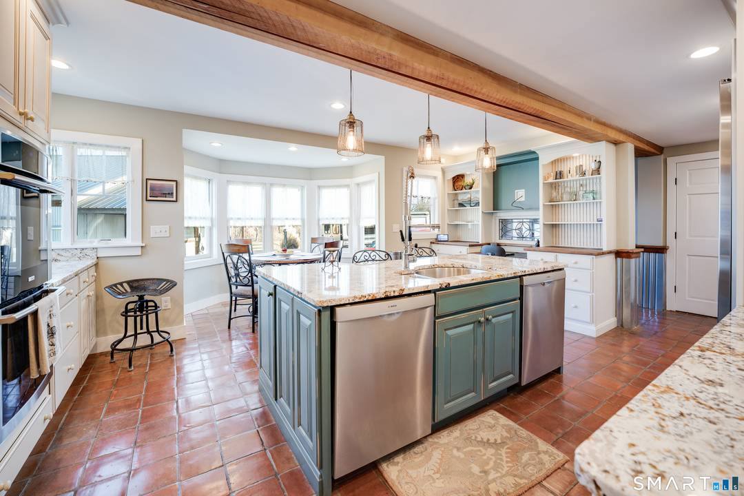 Fabulous Horse property with charming 4 bedroom Farmhouse and 6 stall barn all on 10 meticulously maintained pasture like fenced acres with a pond.