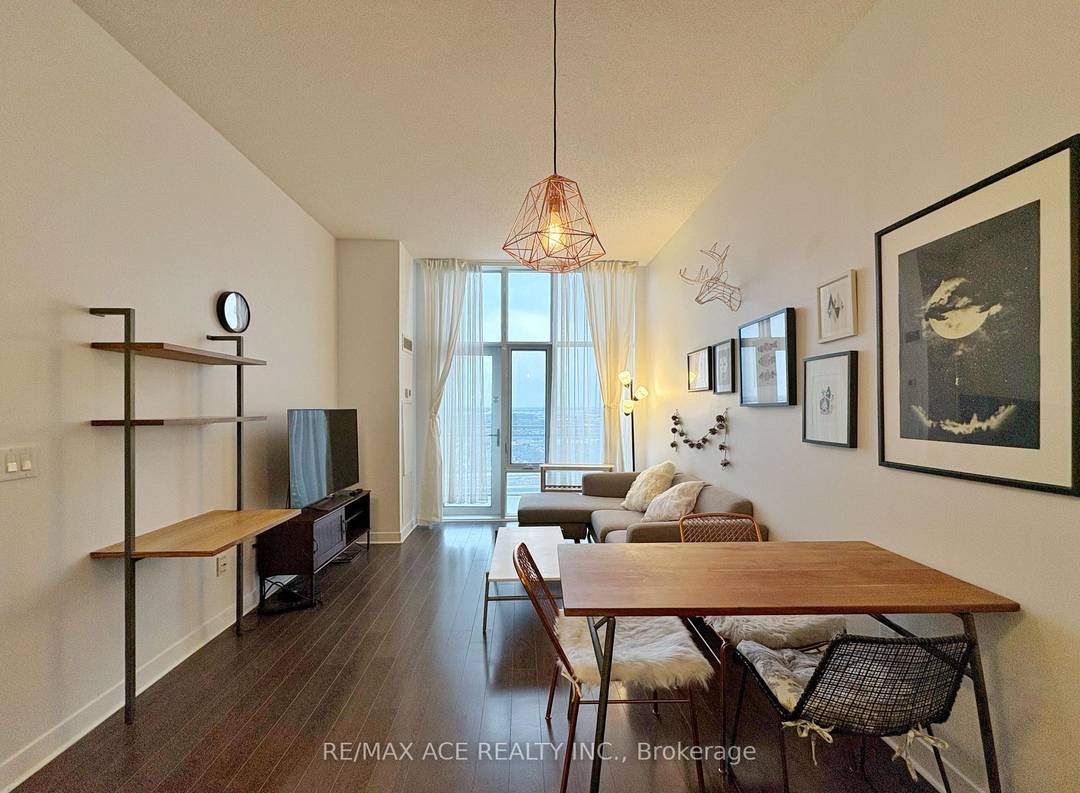 A Must See ! Stunning 1 Den sun filled penthouse unit in The Limelight Square One.