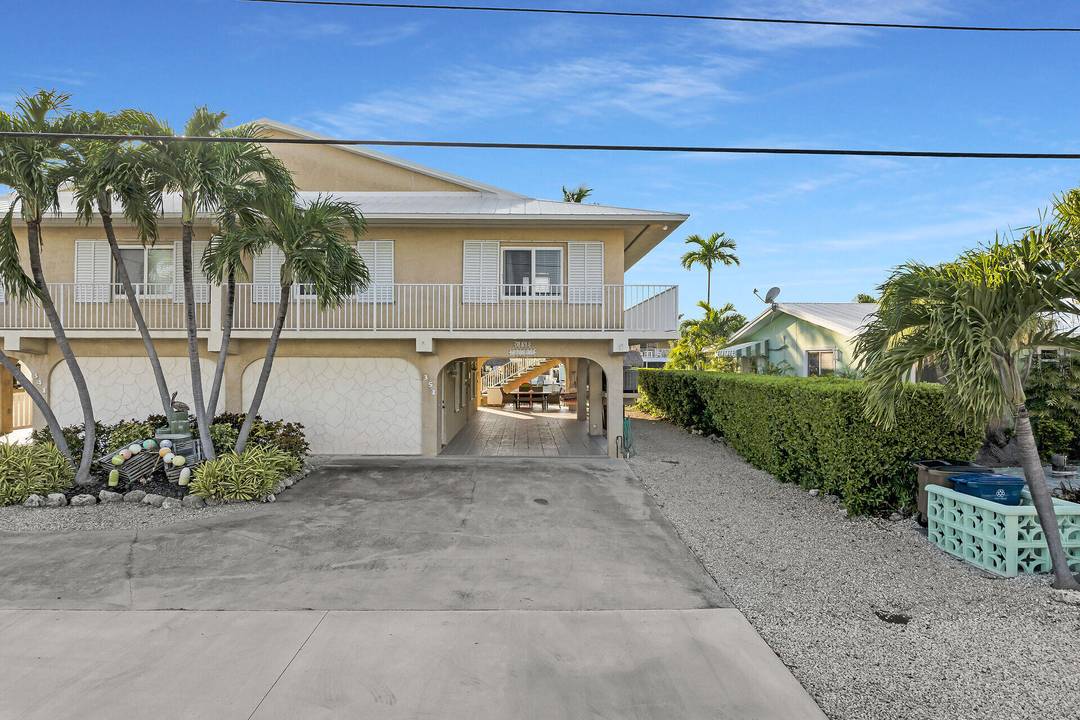 Experience elevated coastal living at 351 10th Street in beautiful Key Colony Beach.