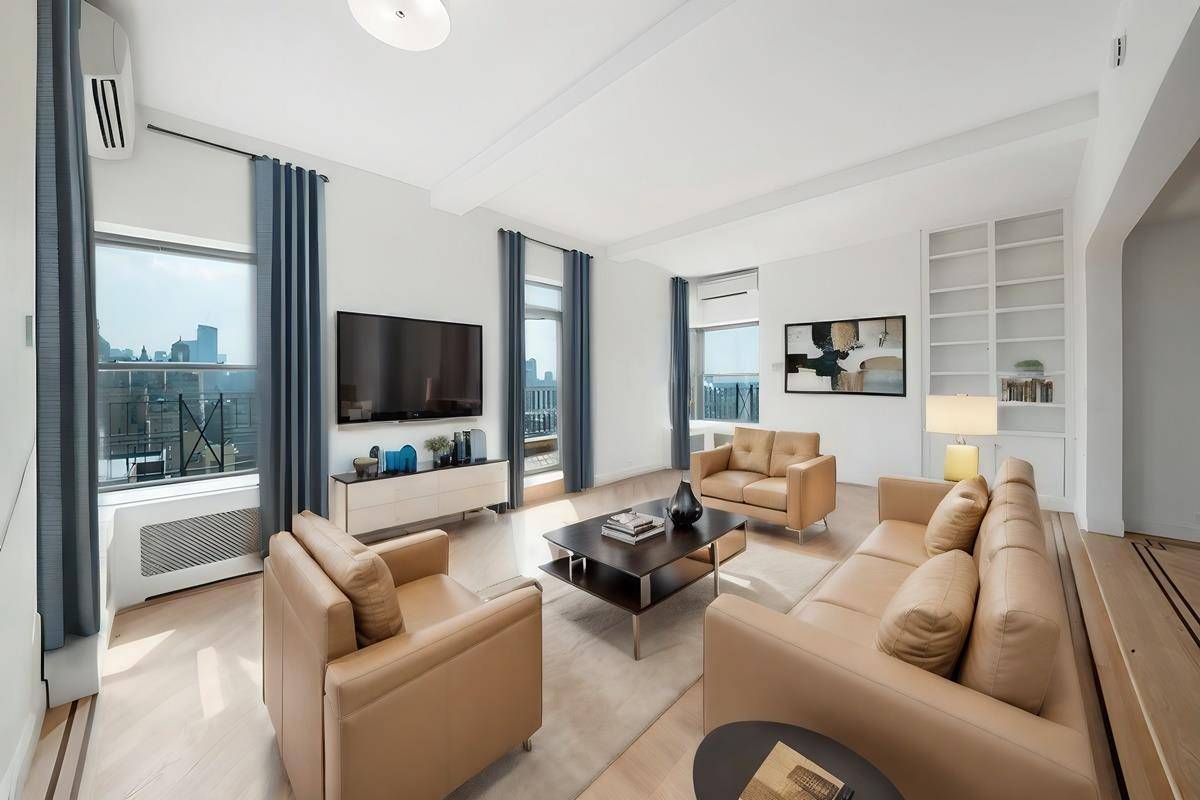 A MAGNIFICENT FULL FLOOR PENTHOUSE HOME BOASTING A WRAP AROUND TERRACE AND A 360 DEGREE VIEW OF THE PARK AND THE CITY !