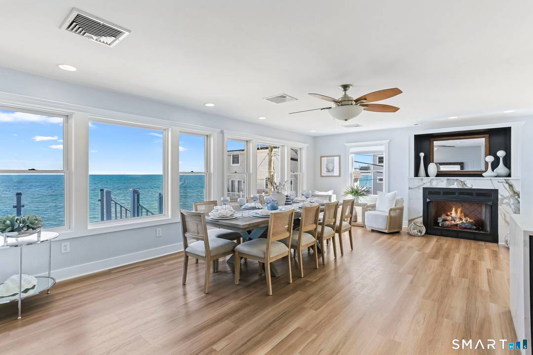 The Shore House at Walnut Beach in Milford offers an extraordinary beachfront retreat with sweeping panoramic views of Long Island Sound and direct beach access steps from your door.