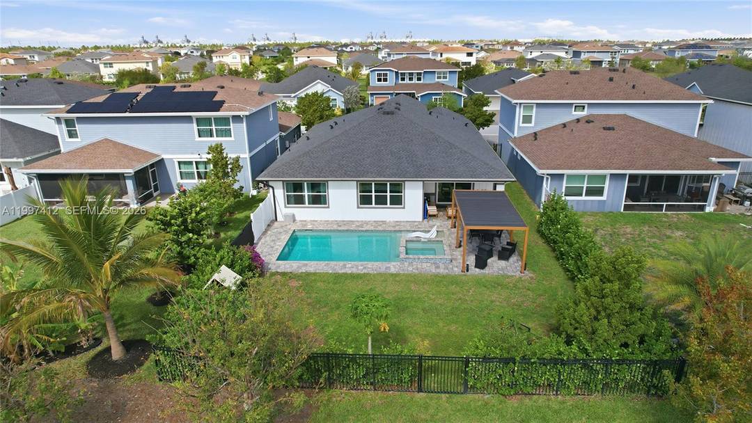 Experience refined South Florida living in this beautifully upgraded 2021 single story residence located in the highly sought after Arden community.