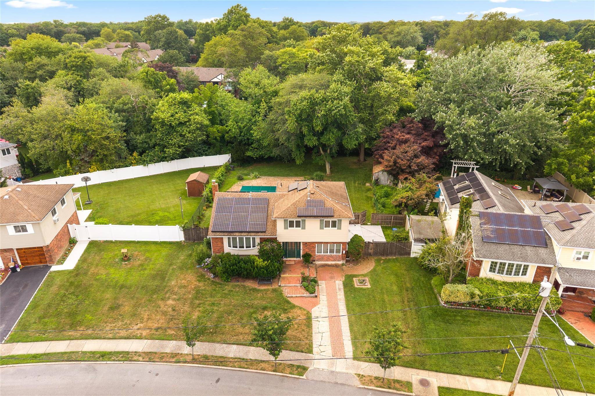 Welcome to this unique and spacious split level home, perfectly situated on a generous 13, 500 sq ft lot.