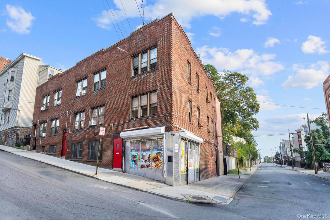 127 131 Highland Avenue Fully Renovated Free Market 8 Unit with Bonus Land This all brick, turnkey property is a rare investment opportunity offering 7 apartments plus a retail store ...