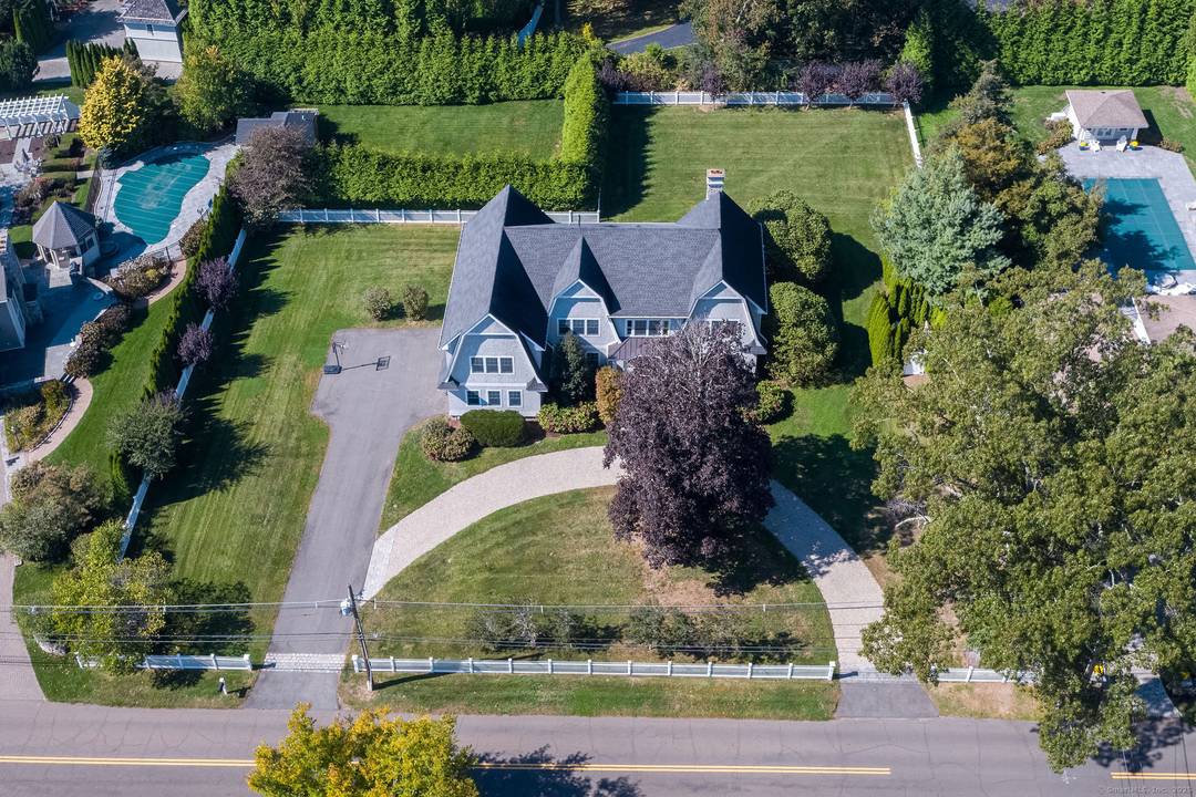 Welcome to 98 Island Avenue in Madison, a stunning coastal residence just a short walk to the beach and town.