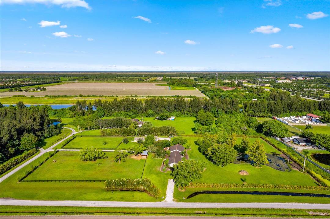 Beautifully landscaped 5 acre horse farm just off Boynton Beach Blvd.