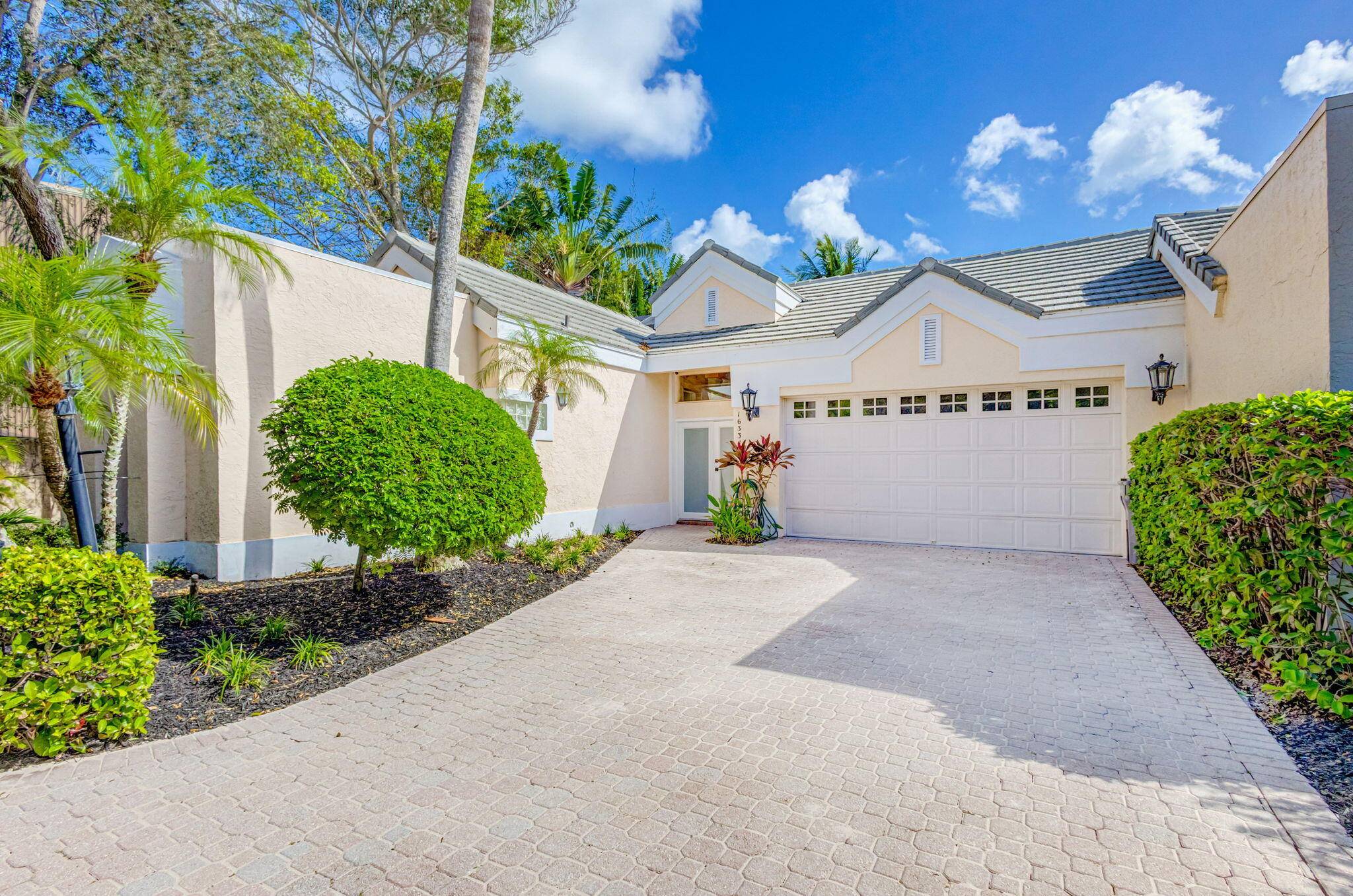 This absolutely stunning WATERFRONT courtyard home sits directly on the Intracoastal !