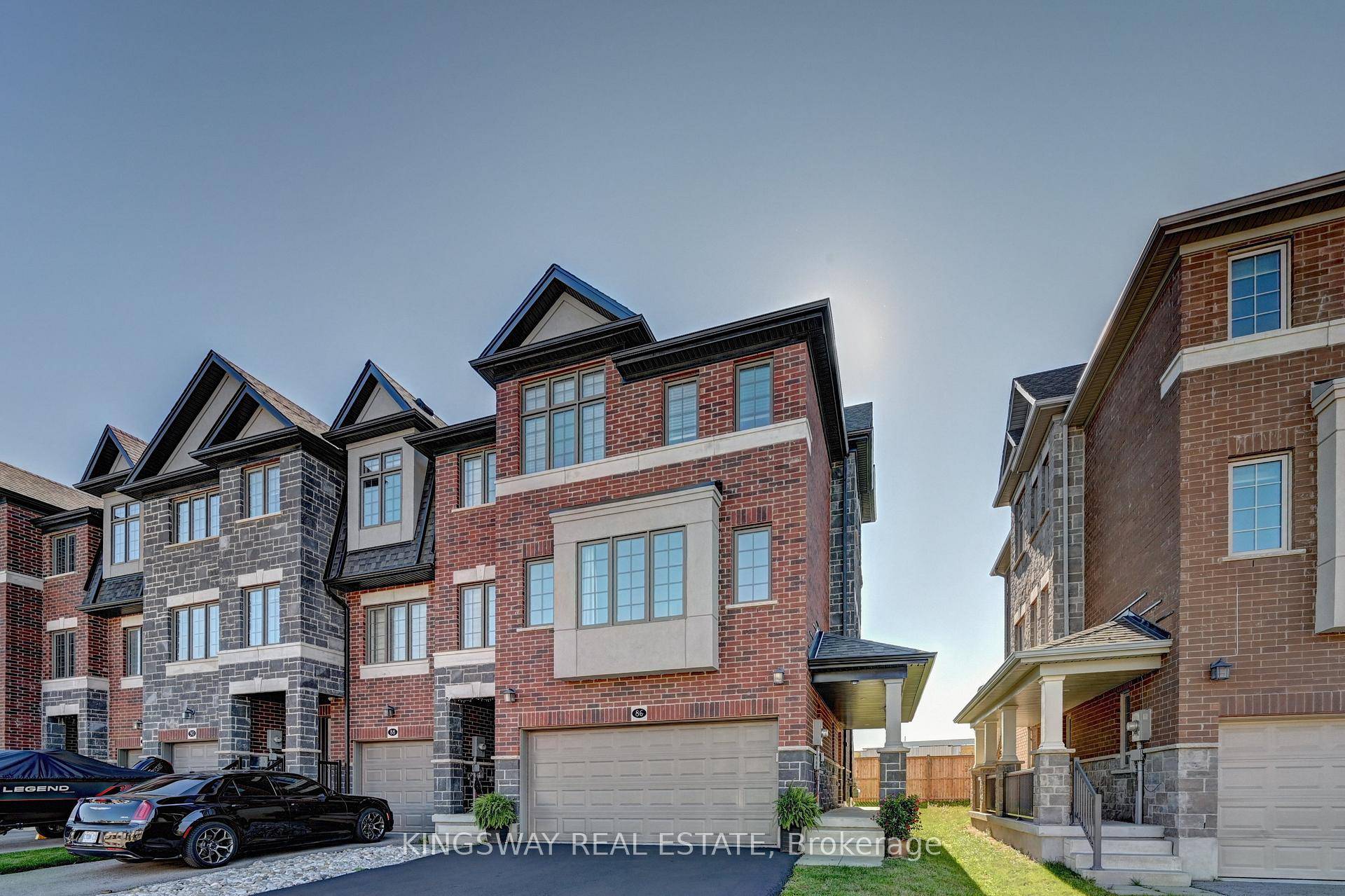 PRICED TO SELL ! ! ! ! Gorgeous 100 Freehold DOUBLE Car Garage End Unit Feels like a Single Townhome in The High Demand Doon Area Close to Hwy 401, ...
