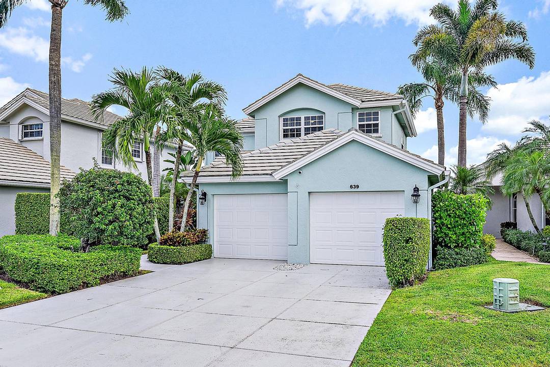 Nestled within the prestigious gated community of The Masters at PGA National, this elegant lakefront residence combines timeless luxury with the comfort of refined Florida living.