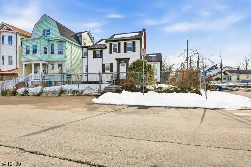 Welcome to 72 Lindsley Ave, a beautifully renovated Colonial situated on a desirable corner lot in Newark, offering classic charm with modern updates.