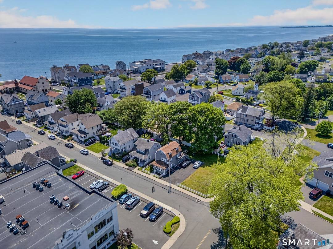 NO FLOOD INSURANCE required in this beautifully renovated 2f home just one short block to Walnut beach.