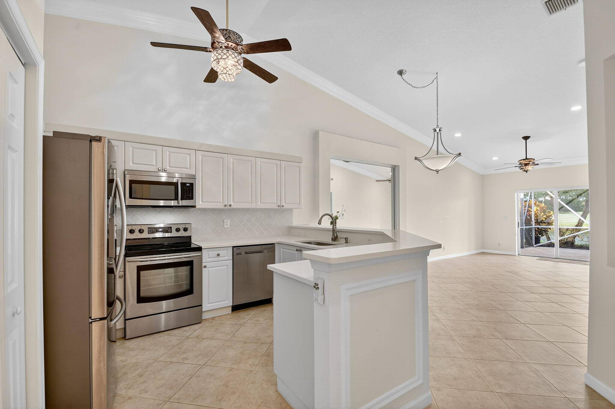 Stunning Lakefront 2 2 Villa with Flexible Den Office SpaceWelcome to this beautifully maintained 2 bedroom villa with a versatile den that can serve as an office, formal dining room, ...