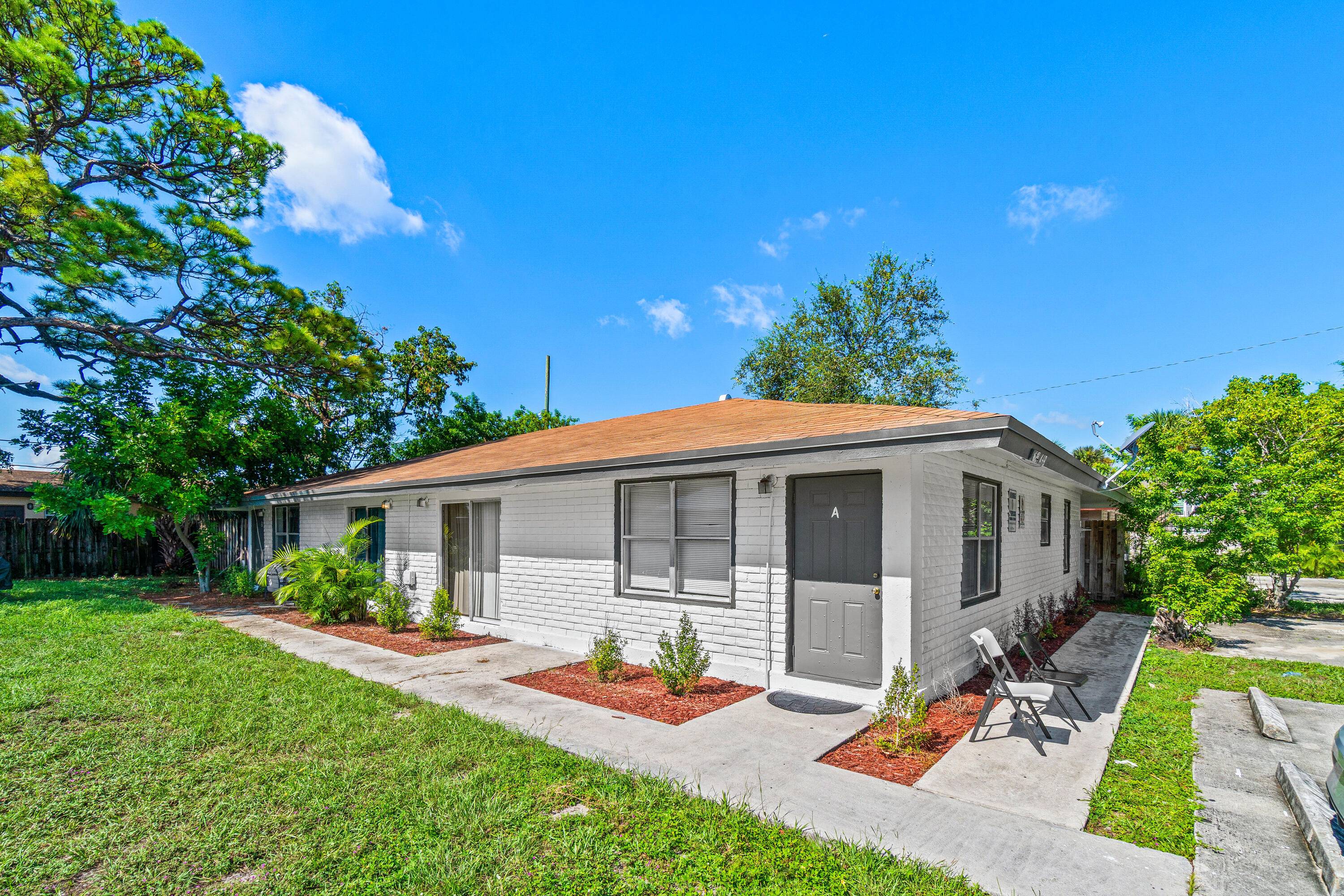 Pics are of 1661 W 27th St Apt A but all units are similarly updated Beautifully updated and maintained duplex with each unit containing 3 beds and 2 baths.