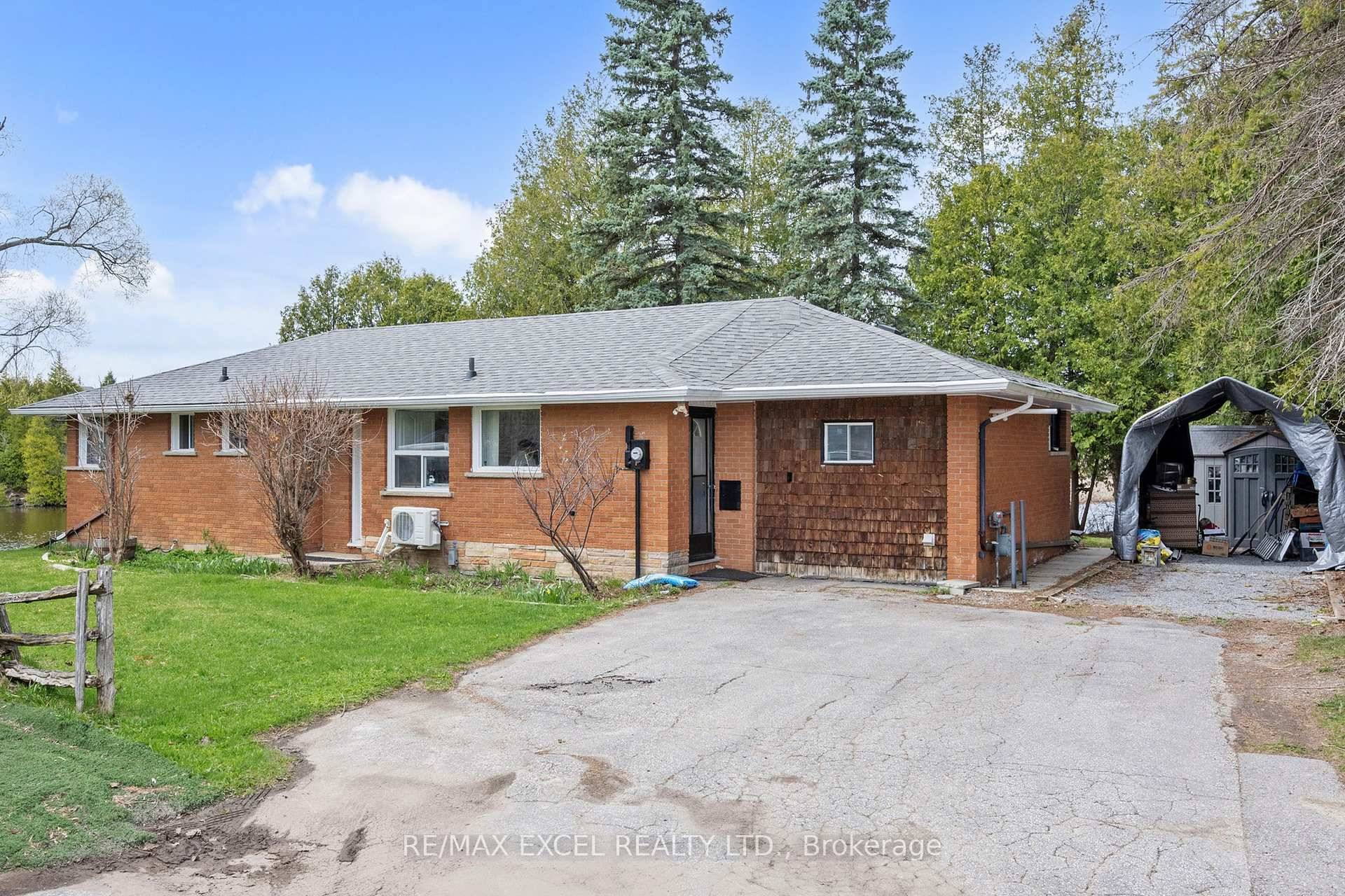 Direct waterfront four season 3 bedroom 2 washroom bungalow home on the serene Black River.