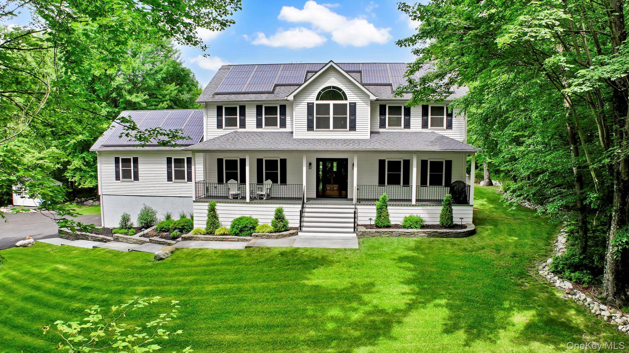 Welcome to this beautiful 4 bedroom Colonial nestled on 5.