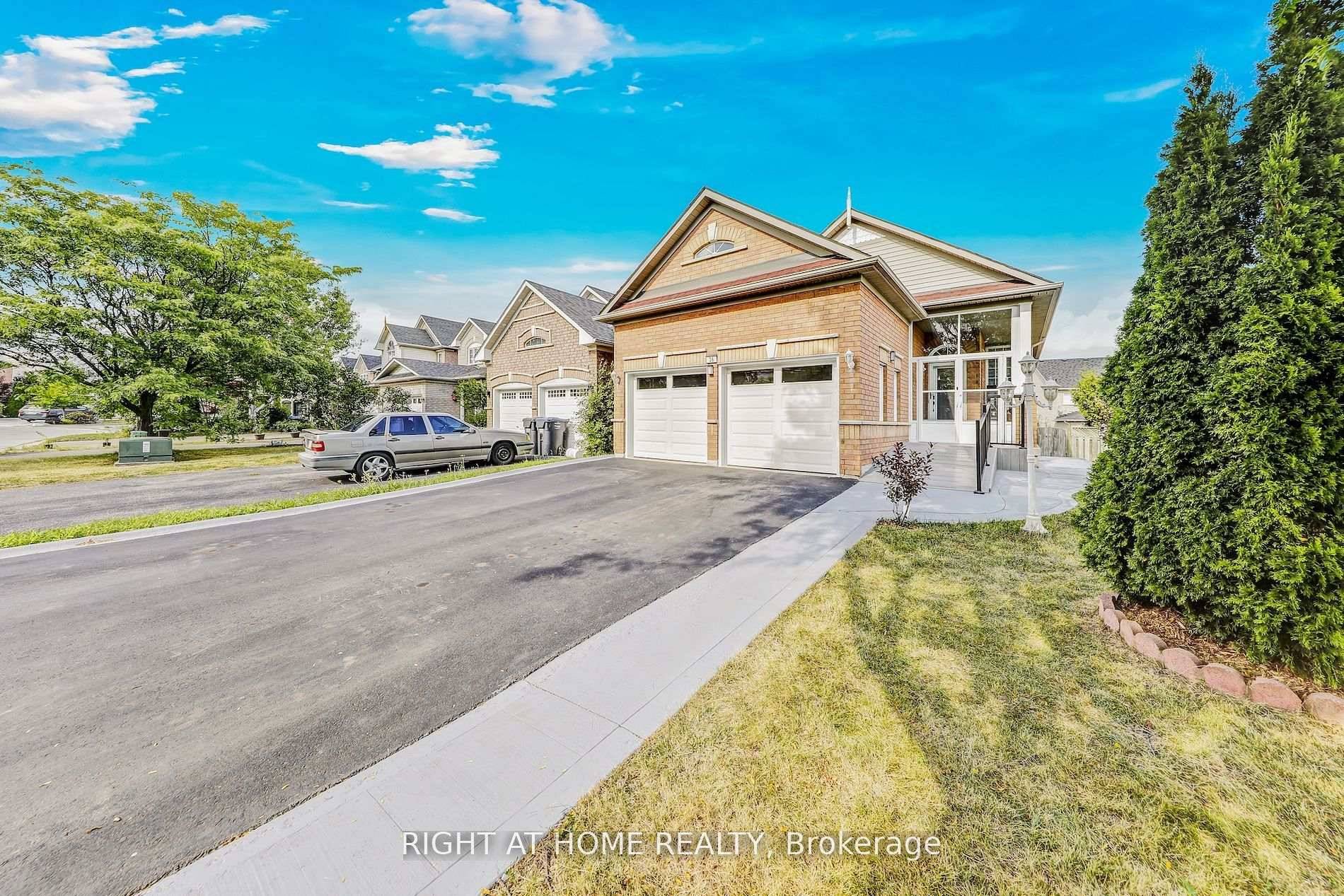 Welcome to this Stunning Detached Raised Bungalow in a Family Friendly Cul de Sac, near a Verdant Pond with Trails and Wildlife.