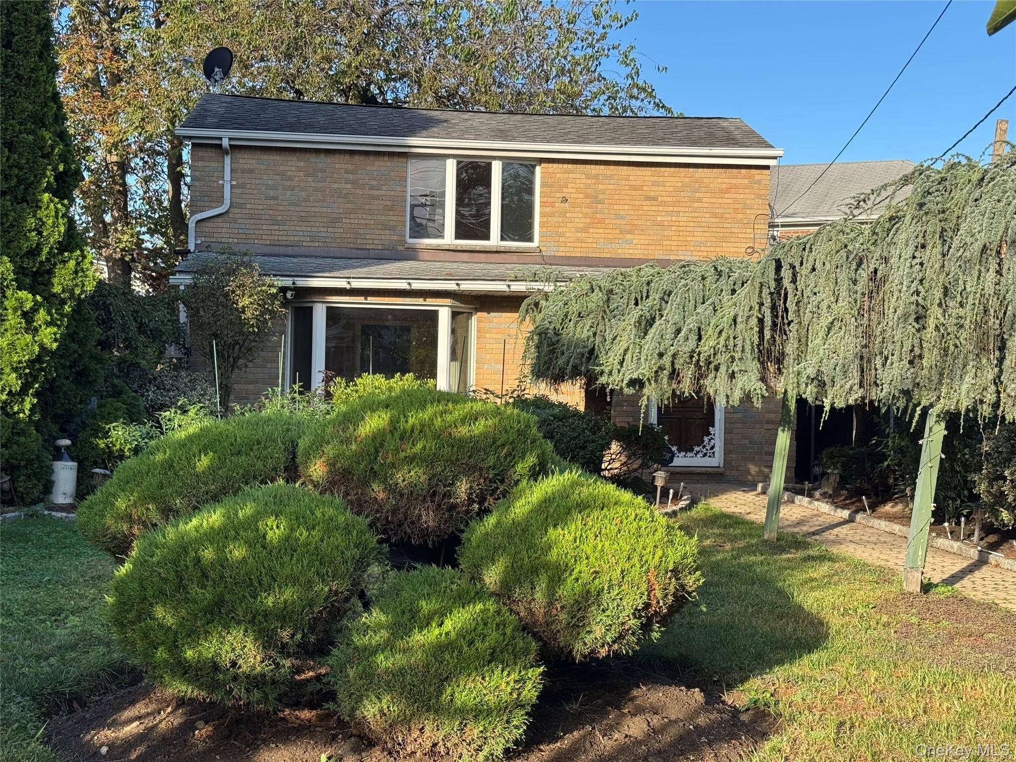 Ideal Starter Home w Three Levels All Brick Detached Colonial features 2 Bedrooms, and 2 Full Baths.