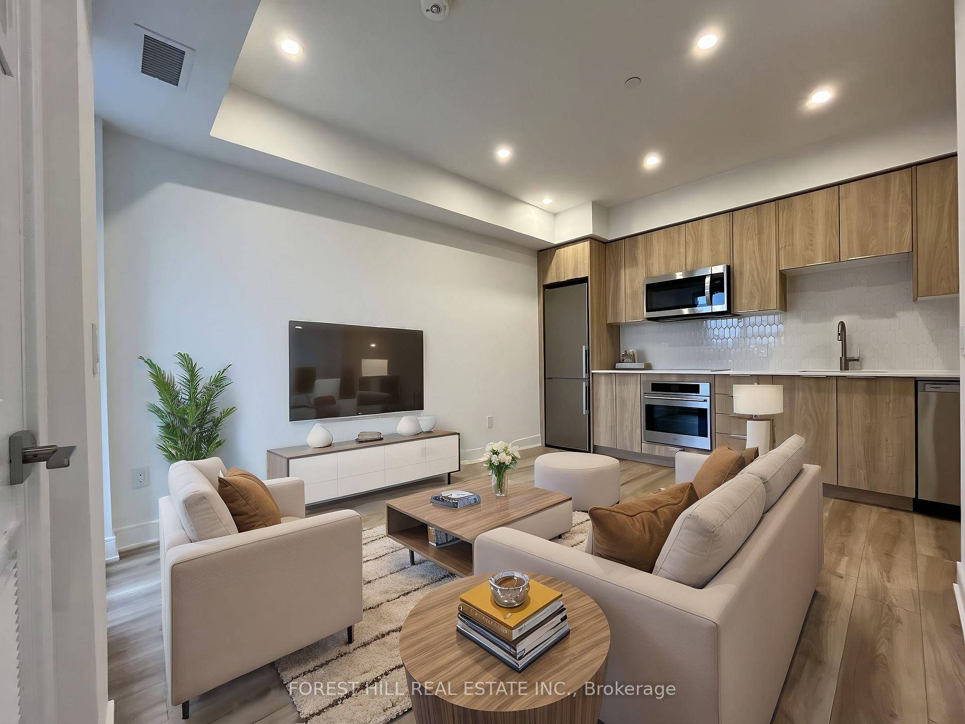 Sun Filled Corner Suite Offers A Spacious Open Concept Floor Plan !