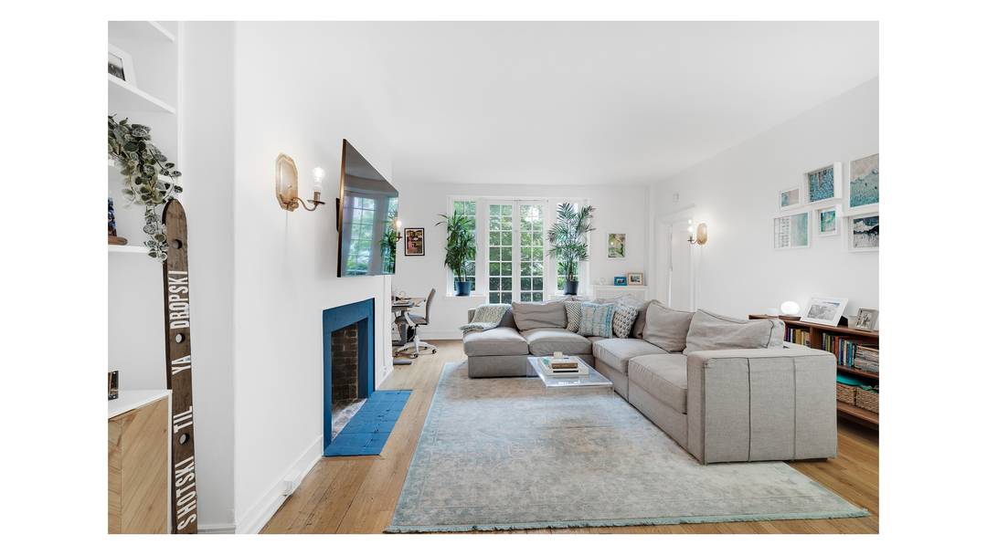 This sun filled prewar two bedroom, two bathroom home in the boutique and historic 171 West 12th Street is as inviting as it is beautifully proportioned.