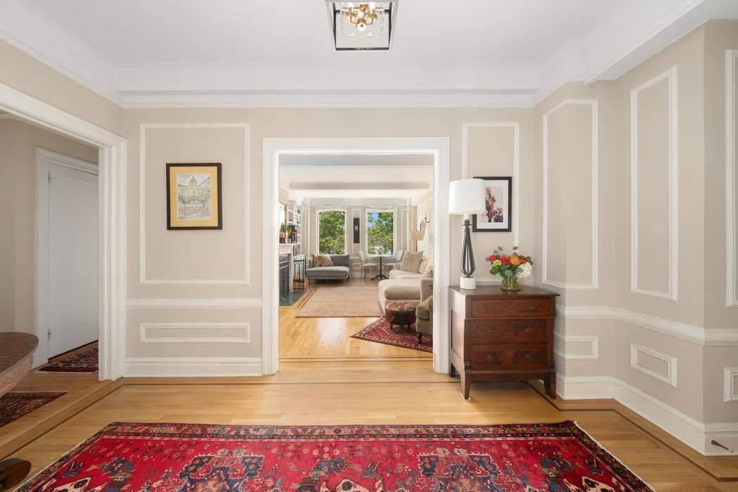 Enter off a semi private landing into a grand open foyer and an impressive span of public entertaining space.