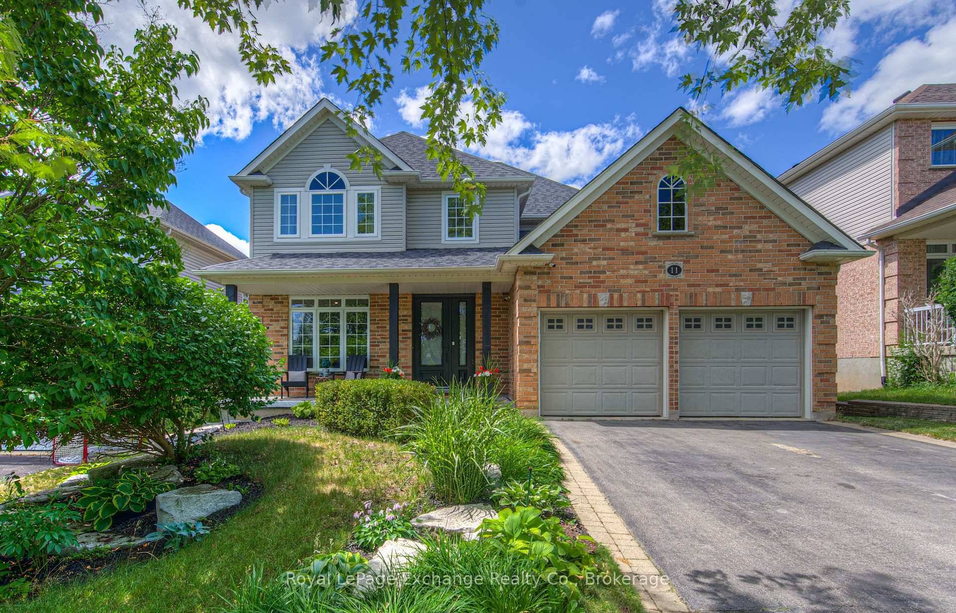 Stylish Home boasting both elegance and comfort in a most desirable location backing onto treed lands.