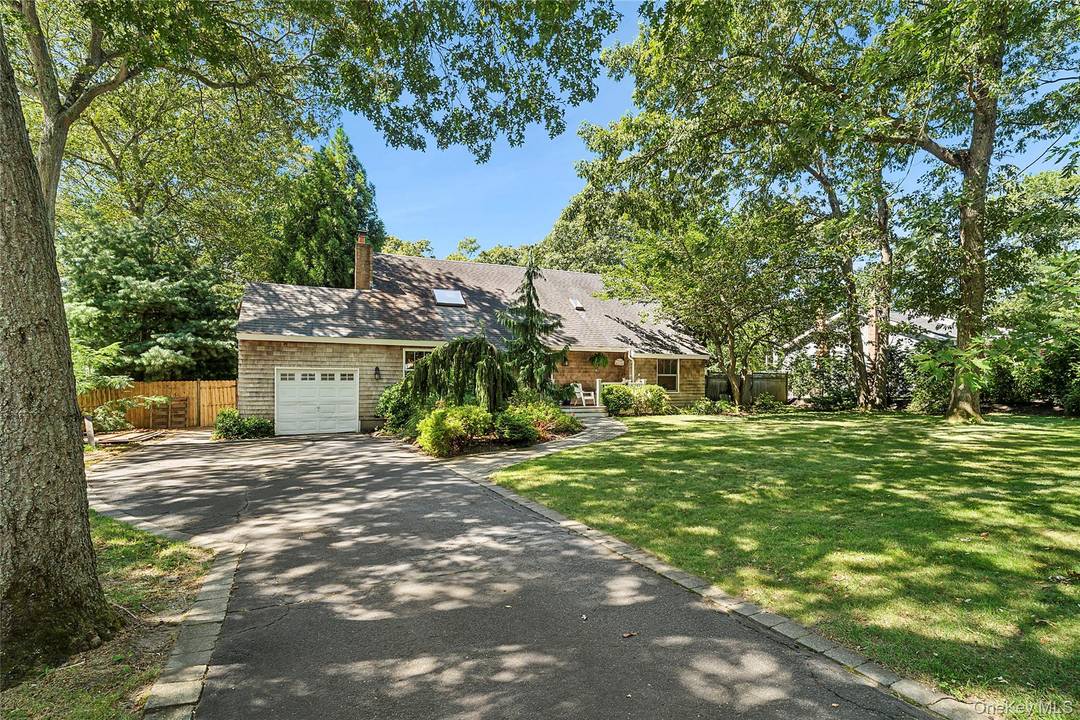 Welcome to the serene hamlet of Aquebogue, a haven of tranquility and comfort.