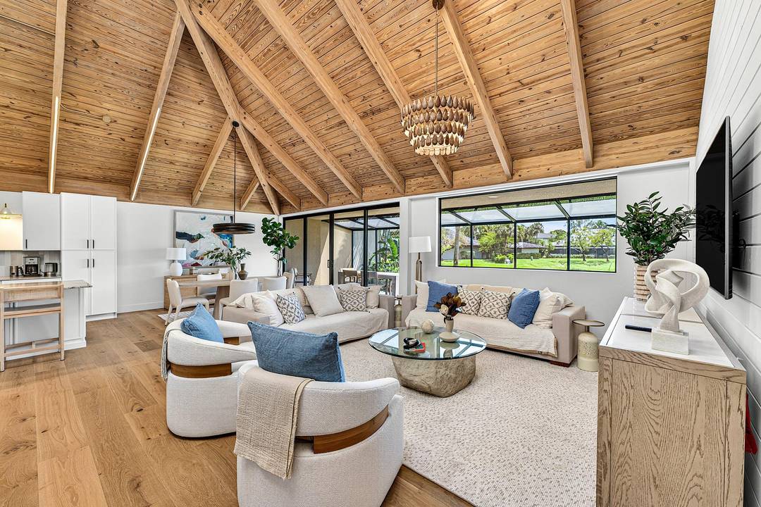 Available for off season rental, this completely renovated bungalow in Palm Beach Polo blends timeless charm with modern elegance, featuring beautiful wood floors and soaring vaulted ceilings that create a ...