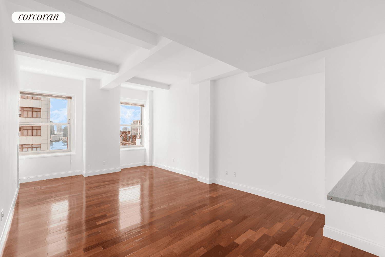 Lofty proportioned large studio showcasing great light from two huge windows with Hudson River views on the 20th floor of The Greenwich Club Residences Condominium.