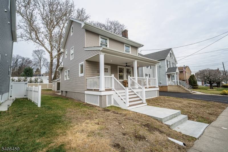 BEAUTIFULLY REMODELED CUSTOM COLONIAL HOME !