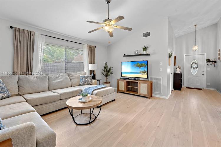 Welcome to this beautifully maintained 3 bedroom, 2 bathroom home in the desirable Boca Winds community of West Boca Raton.