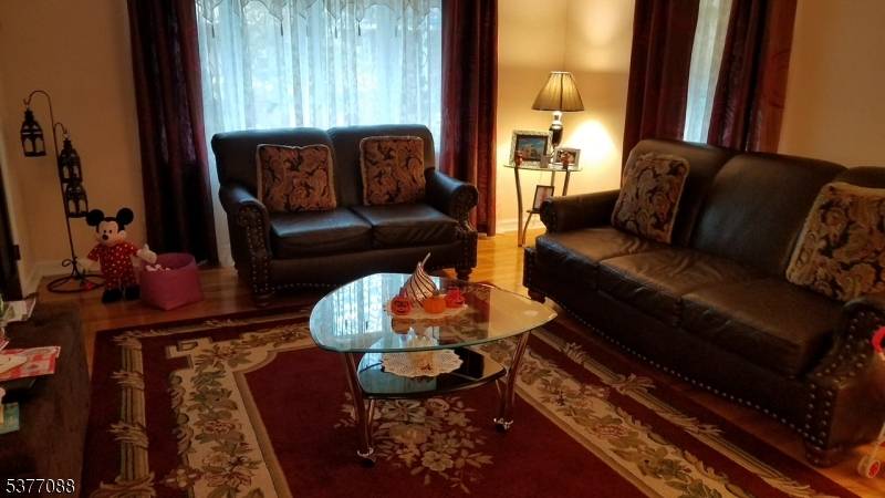 Welcome to this charming top over bottom two family home located in a wonderful neighborhood.