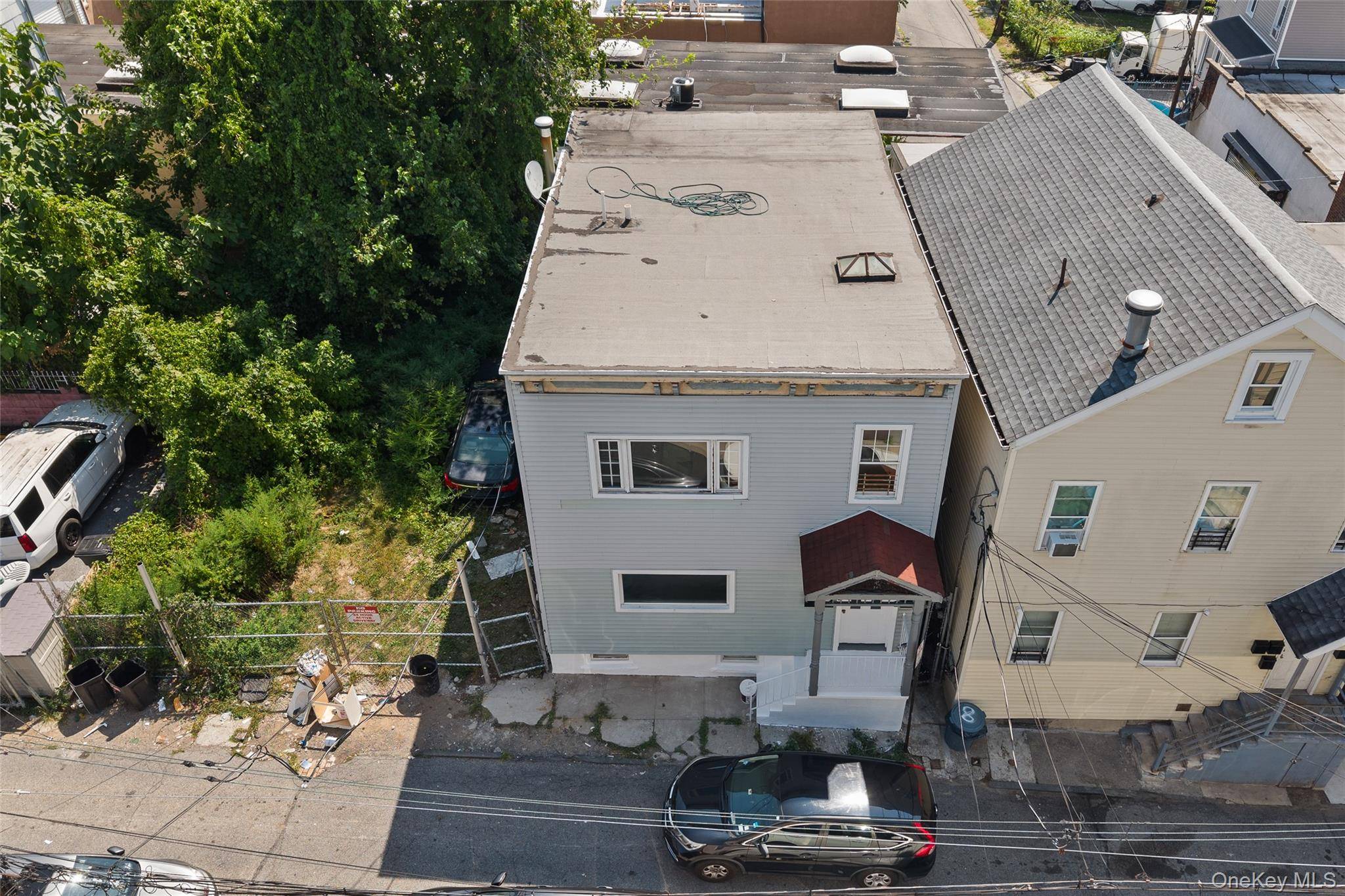 Welcome to this FULLY RENOVATED two family home !