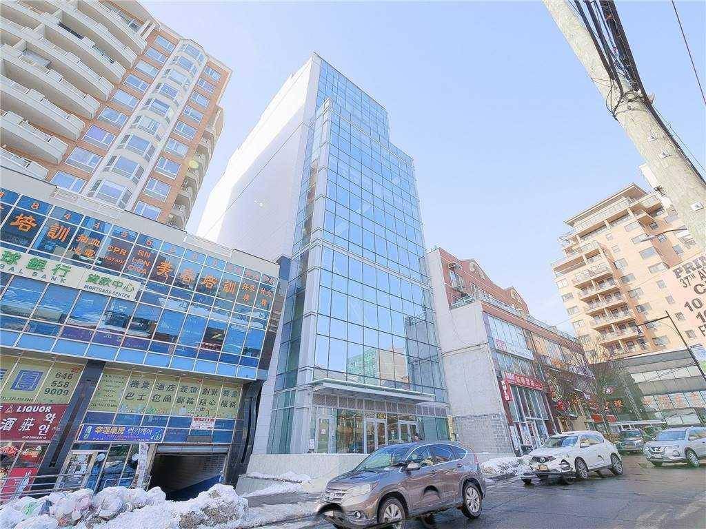 Tangram Tower office with large window facing Manhattan.