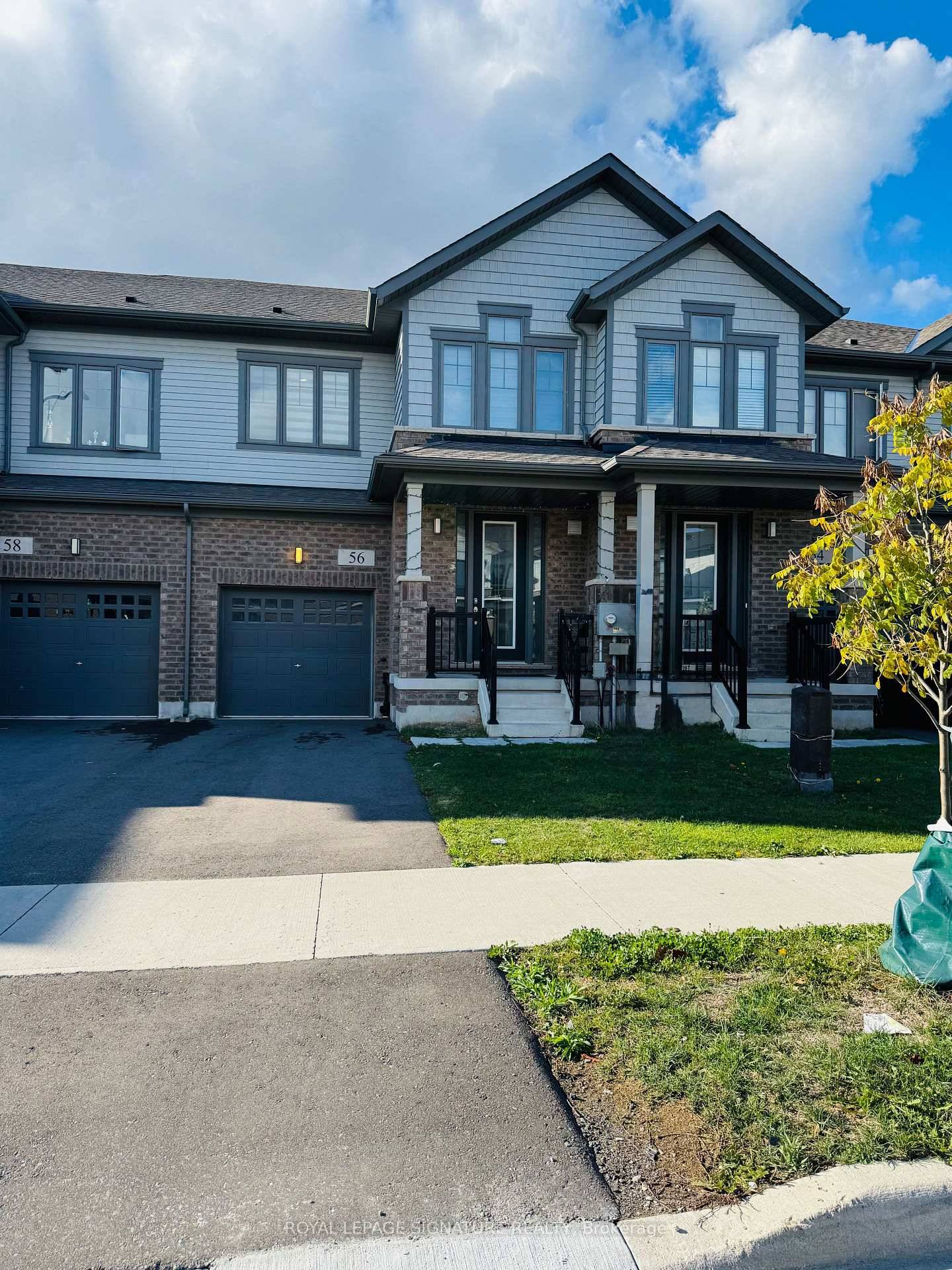 Welcome to this Beautiful freehold townhouse nestled in the serene neighborhood of Mount Hope, Hamilton.