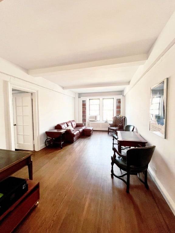Incredibly spacious 1170 sq ft pre war two bedroom two bathroom plus dining room, half a block from Central park !