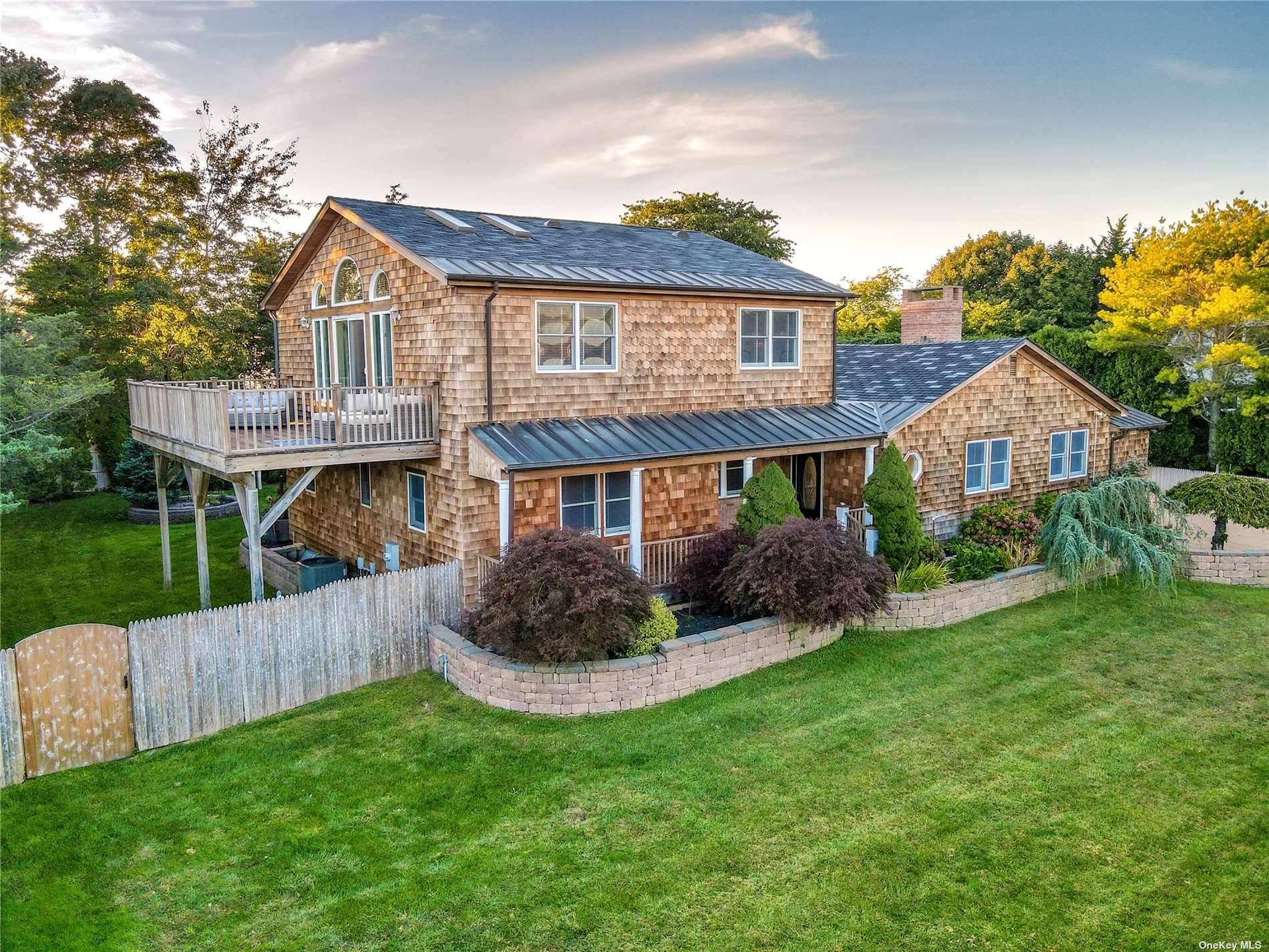 Come Home to this Distinctive retreat a stone throw from Ocean and Bay Beaches.