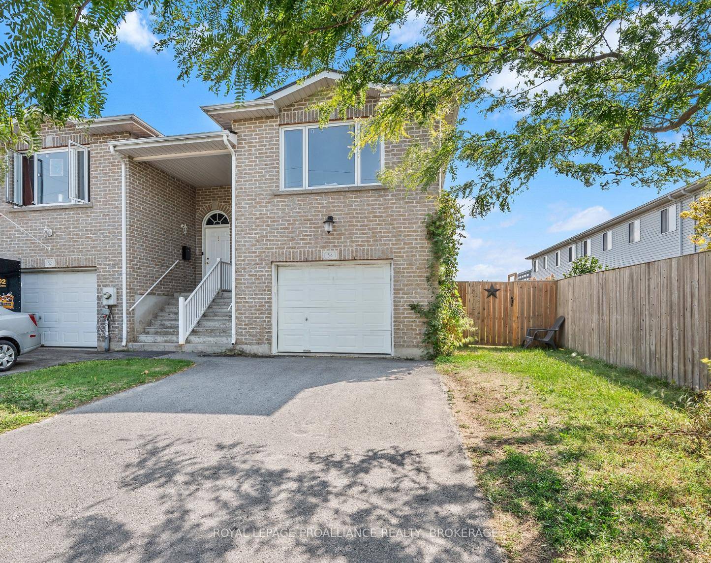 Welcome to this bright and deceivingly spacious 2 1 bedroom end unit home with a beautifully finished walk out basement.