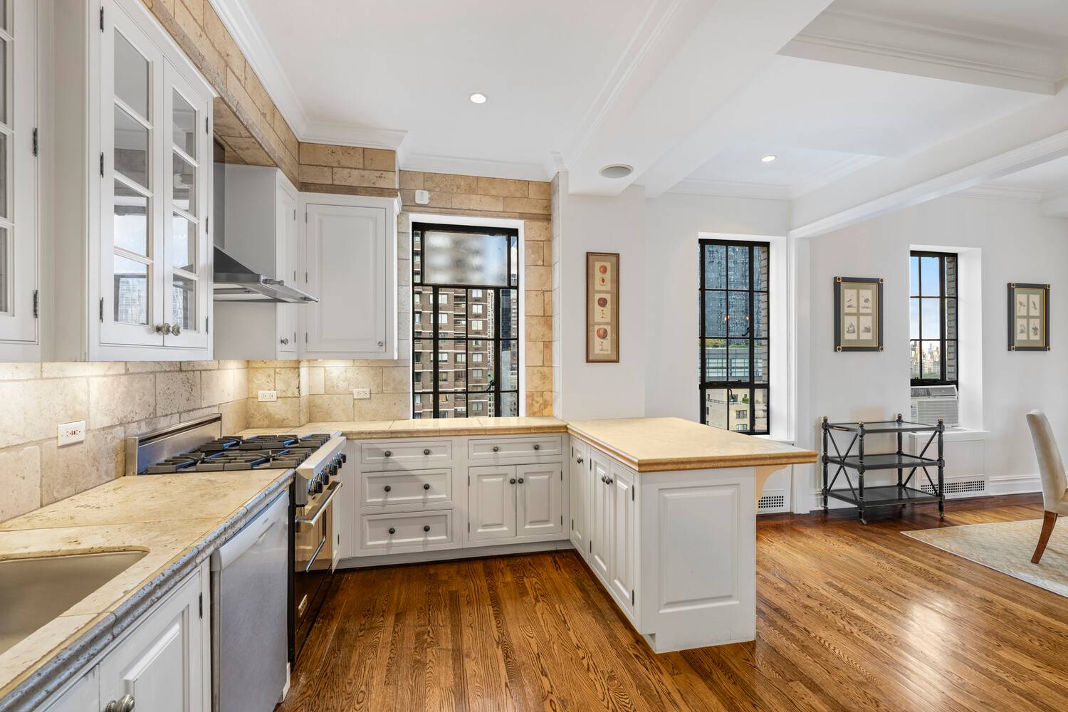 A Rare Two in One Opportunity Legally combined, this unique residence offers the flexibility of two adjoining homes under one roof.