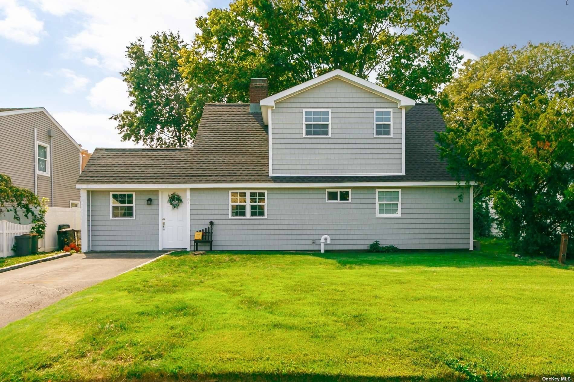 Move right into this stunning home located in the beautiful and quiet neighborhood of Westbury.