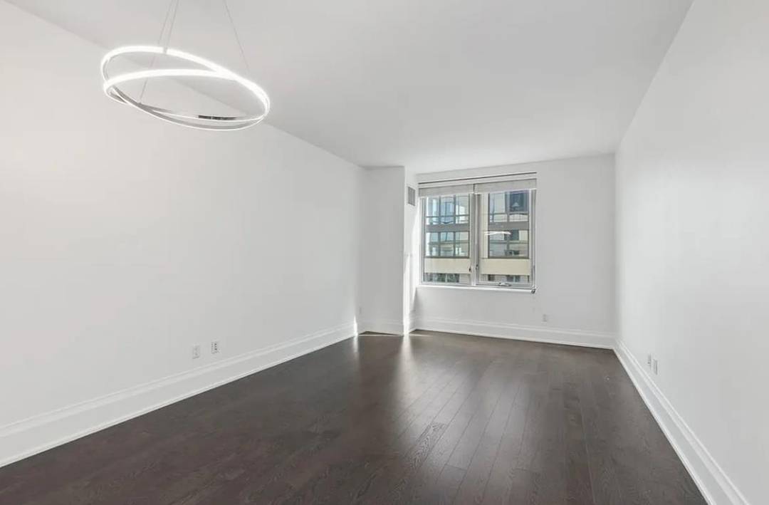 This gracious 1, 302 SF two bedroom, 2.