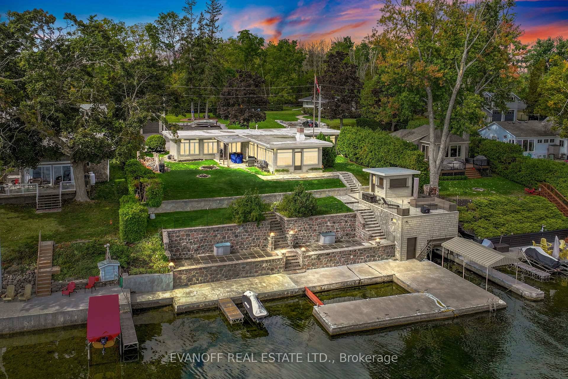 Welcome to a truly remarkable Sturgeon Lake retreat, where modern comfort meets the tranquility of waterfront living !