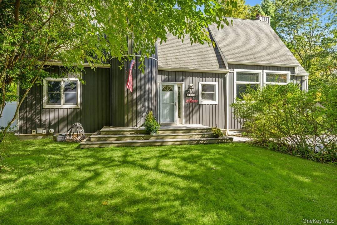 Welcome to this light filled 4 bed, 2 bath home tucked away on a quiet dead end street in East Quogue.