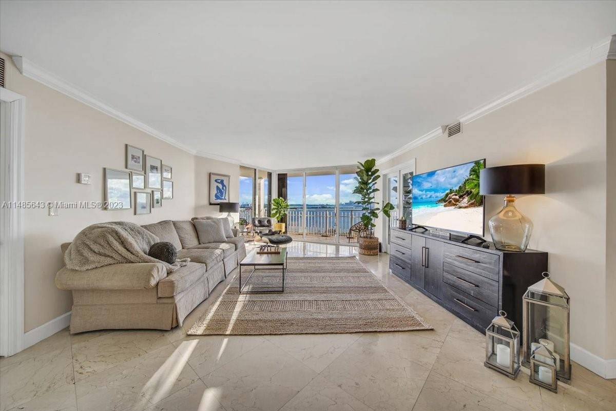 The unit offers breathtaking views of the water from every room.