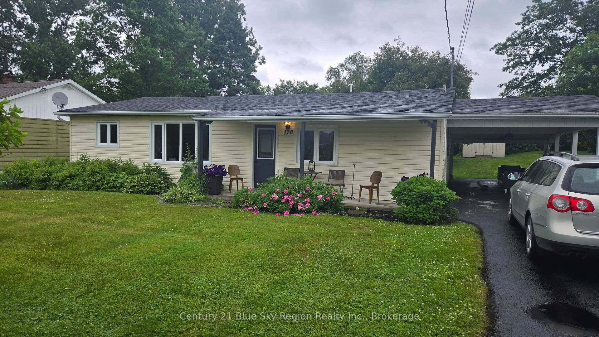 Charming, low maintenance 3 bedroom bungalow on a slab on grade foundation perfect for those seeking single level living.